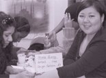 Students at the Exhibition getting Henna tatoos