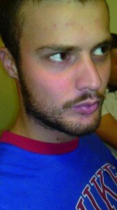 student rob kerr with a moustache